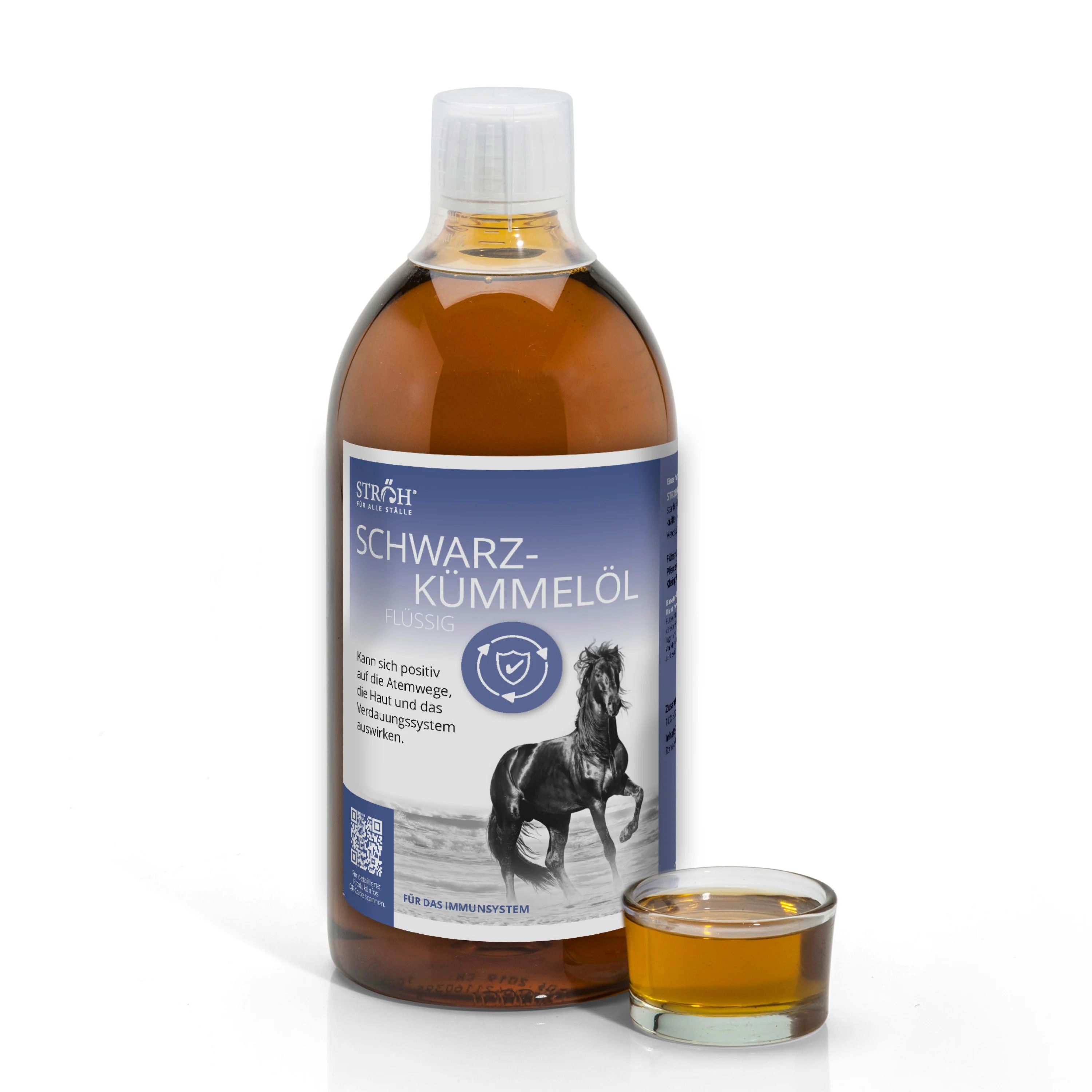 Braune Flasche mit weißem Deckel und Etikett. Kleines Glas mit Öl daneben. Aufschrift: STRÖH Schwarzkümmelöl.