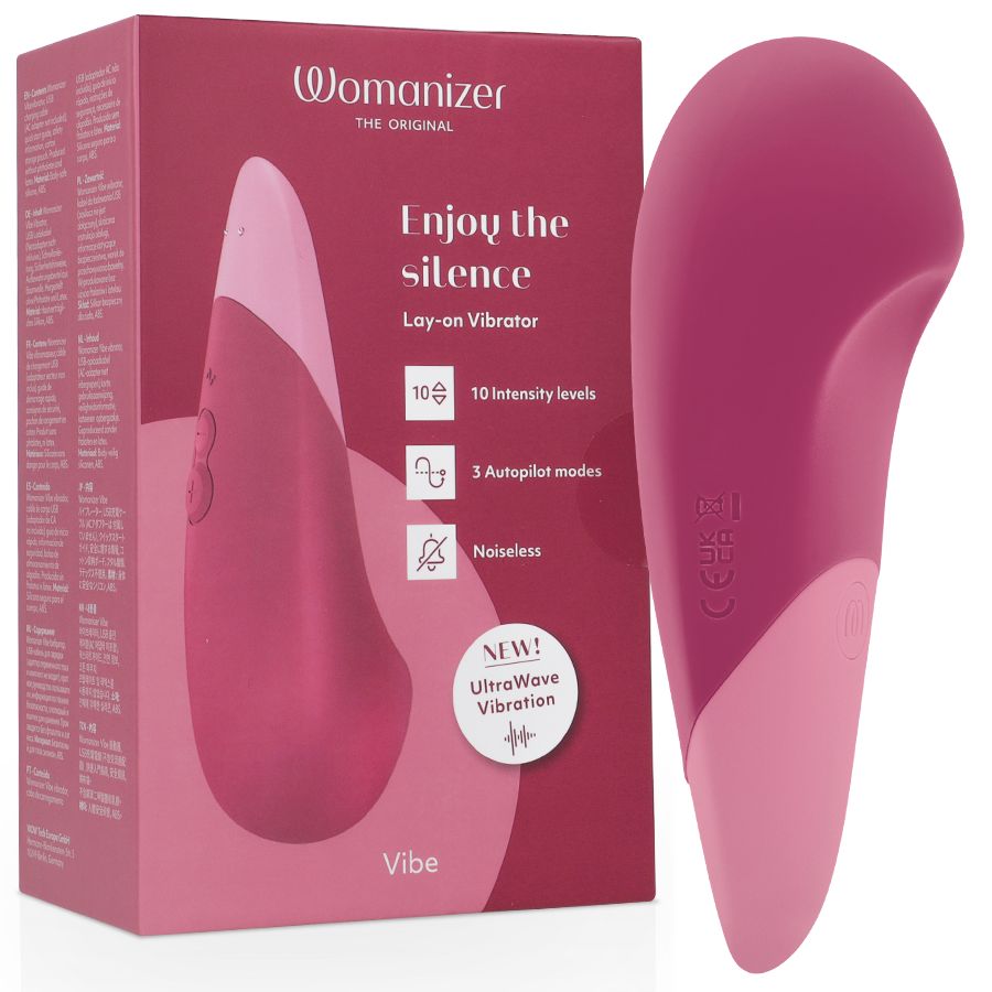 Womanizer-Vibrator und Verpackung. Rosa Vibrator neben rosa Box. Text auf Box: Enjoy the silence, 10 Intensitätsstufen, 3 Modi, geräuschlos.