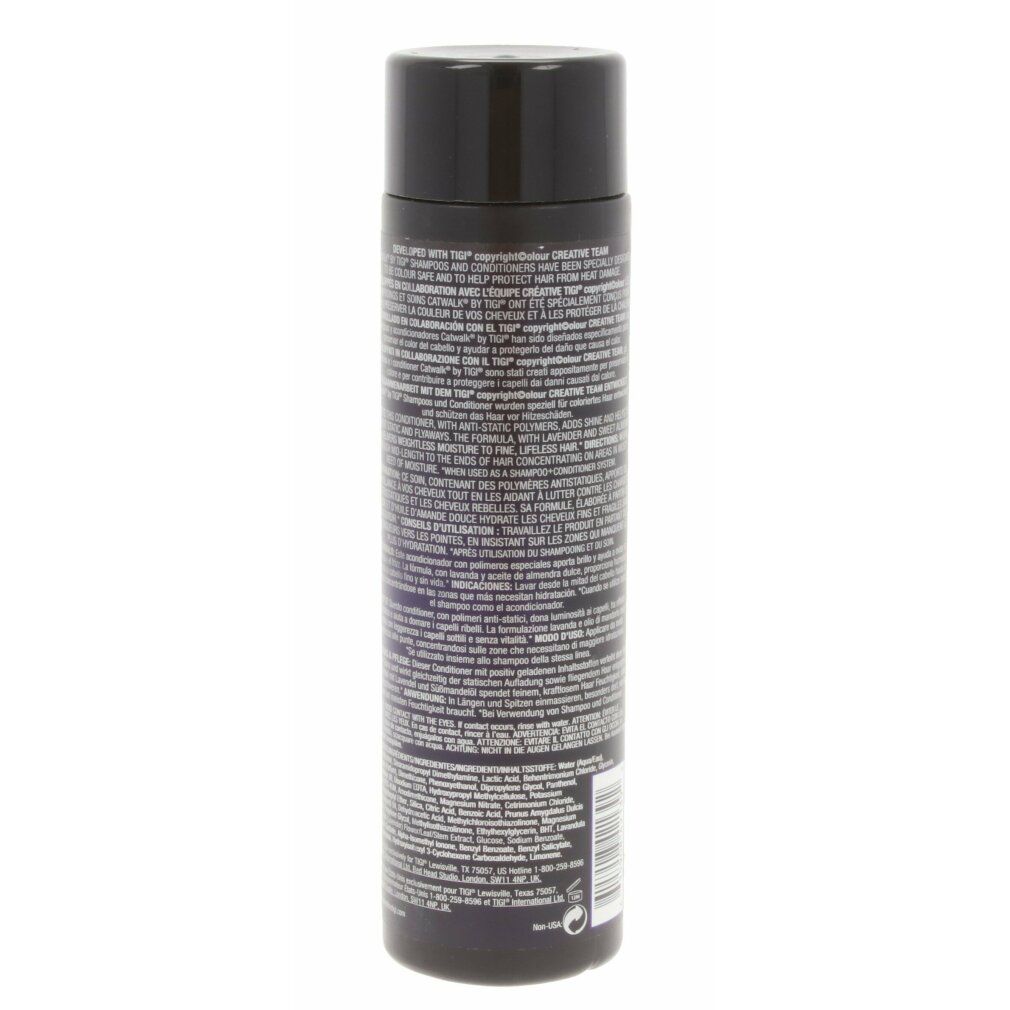 Schwarze Flasche mit Text. Rückseite des Produkts. Text in mehreren Sprachen.