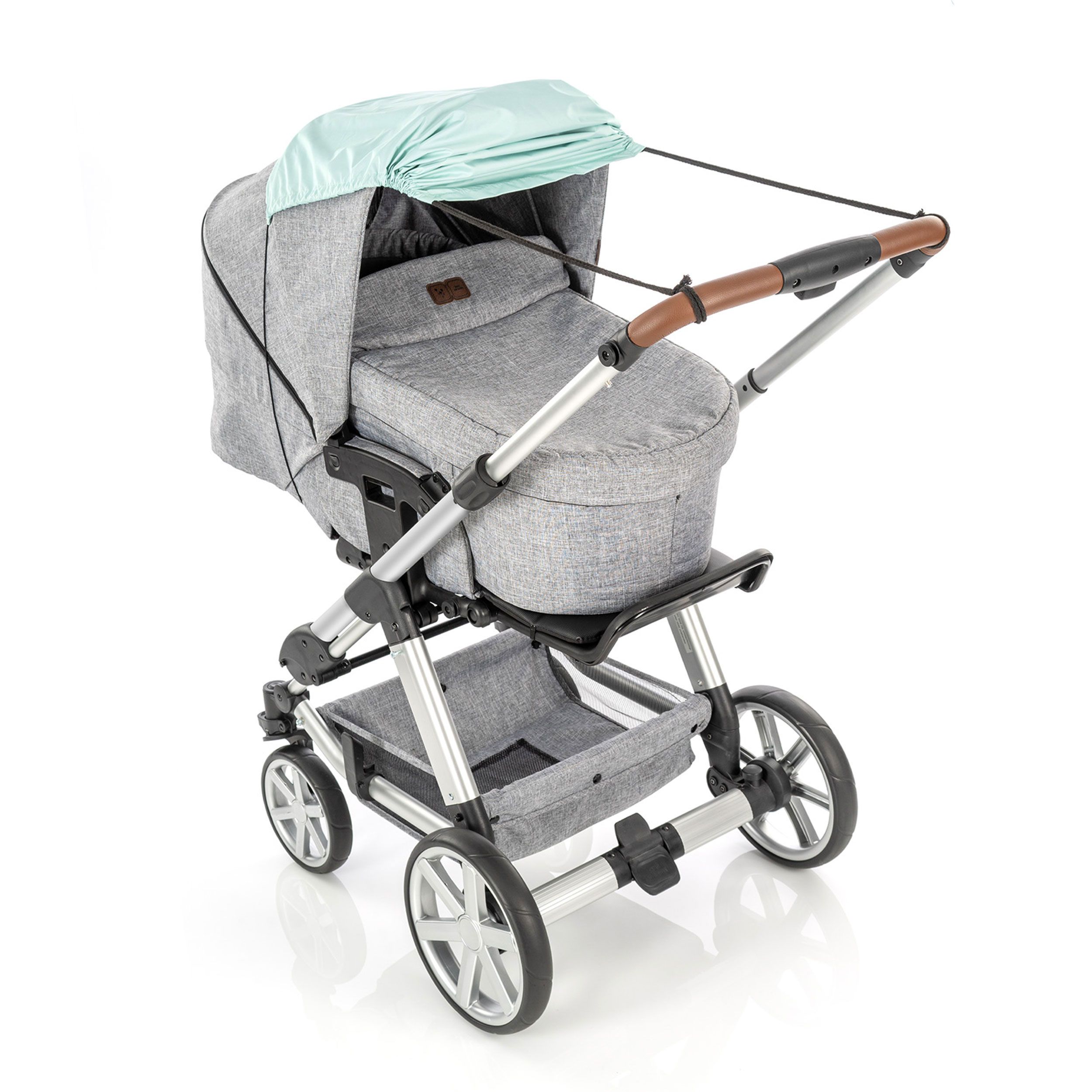 Grauer Kinderwagen mit mintgrünem Verdeck und braunem Griff.