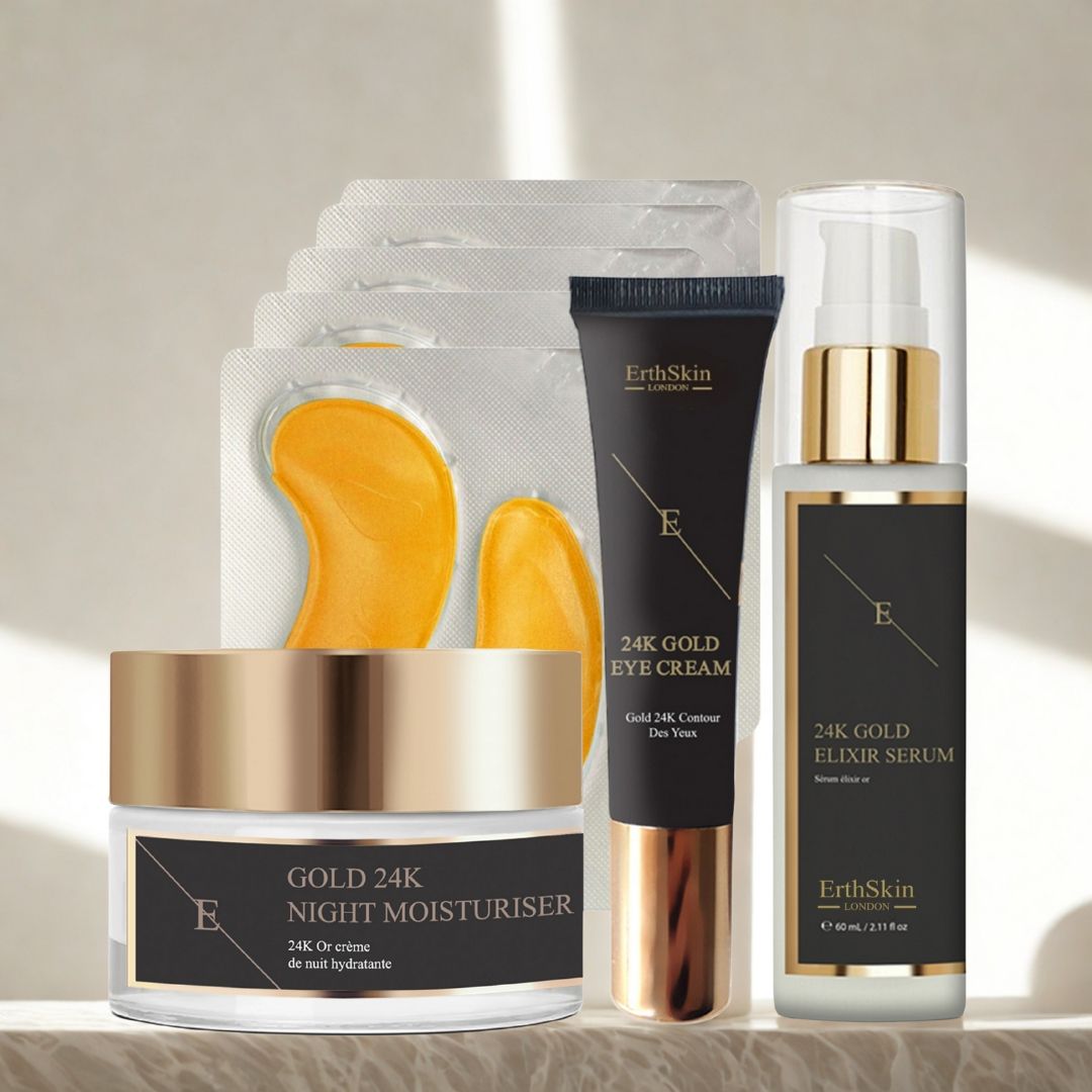 ErthSkin London Produkte: Nachtcreme, Augencreme, Elixier-Serum und Augen-Pads. Schwarze Verpackungen mit Goldakzenten. Auf hellem Hintergrund.
