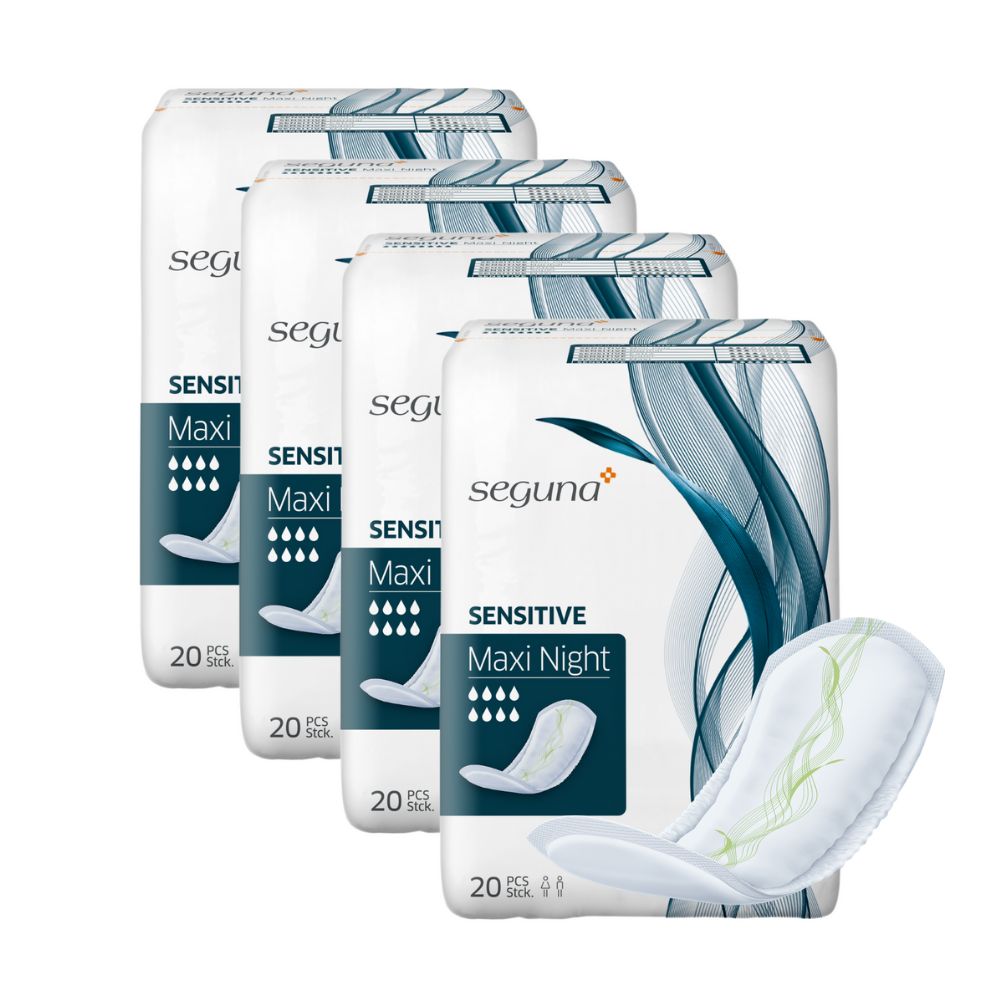 Mehrere Packungen SEGUNA Sensitive Maxi Night und ein einzelnes Produkt. Weiße Verpackung mit blauer Grafik und Produktinformationen.