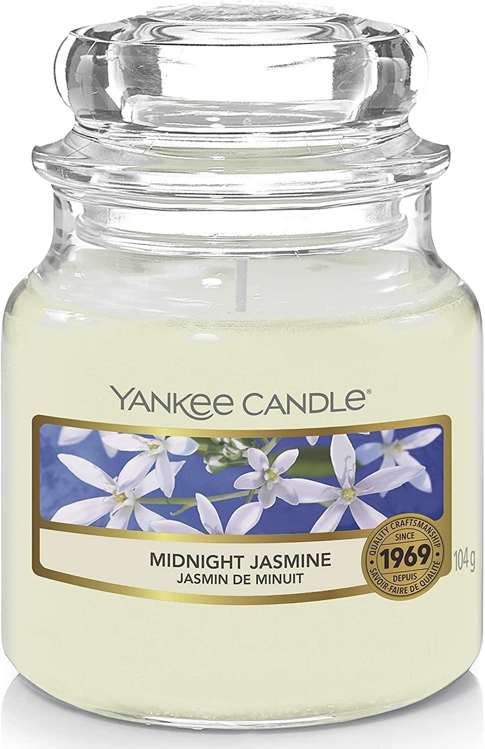 Yankee Candle Duftkerze Midnight Jasmine im kleinen Glas. Mit Deckel. Aufkleber mit Blumenmotiv und Produktbezeichnung. Qualitätsauszeichnung.
