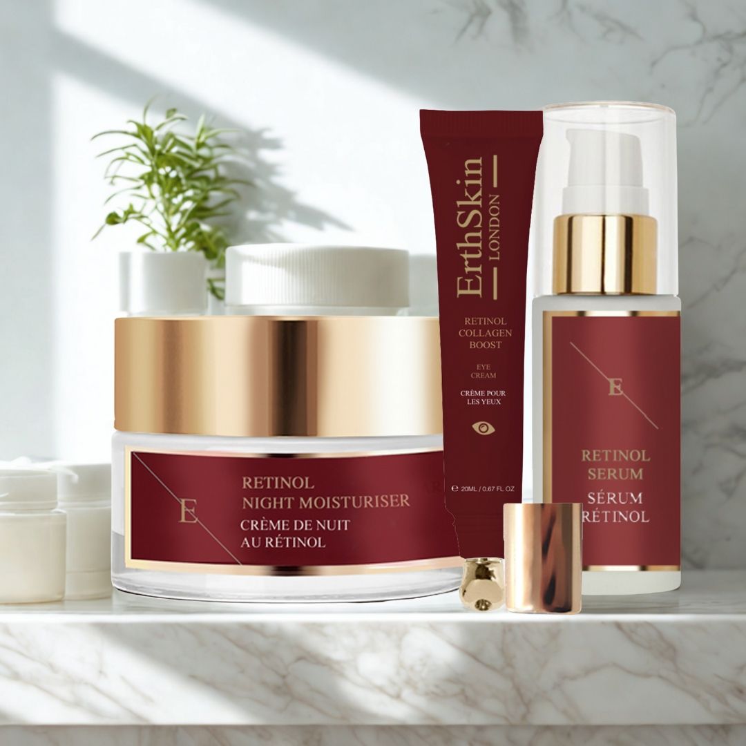 ErthSkin London Retinol-Set: Augencreme, Nachtcreme, Serum. Rote, goldene Verpackung, auf Regal.