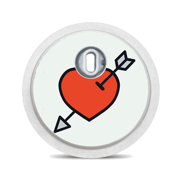 Runder Aufkleber mit rotem Herz und Pfeil auf hellgrünem Hintergrund. Oben ein silberfarbener Sensor.