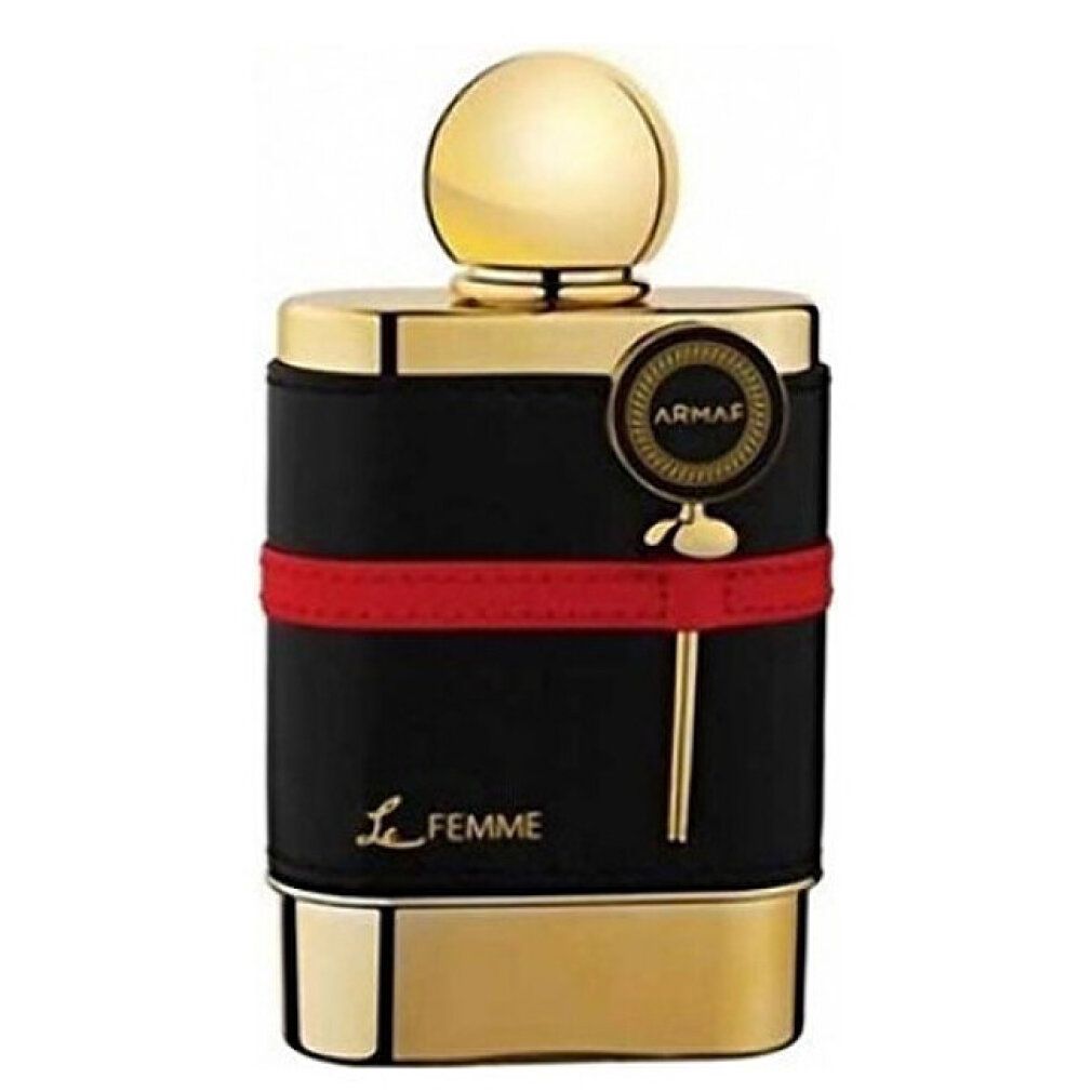 Goldfarbener Flakon mit schwarzem Lederband und rotem Streifen. Aufschrift: Le Femme Eau de Parfum. Goldener Verschluss.