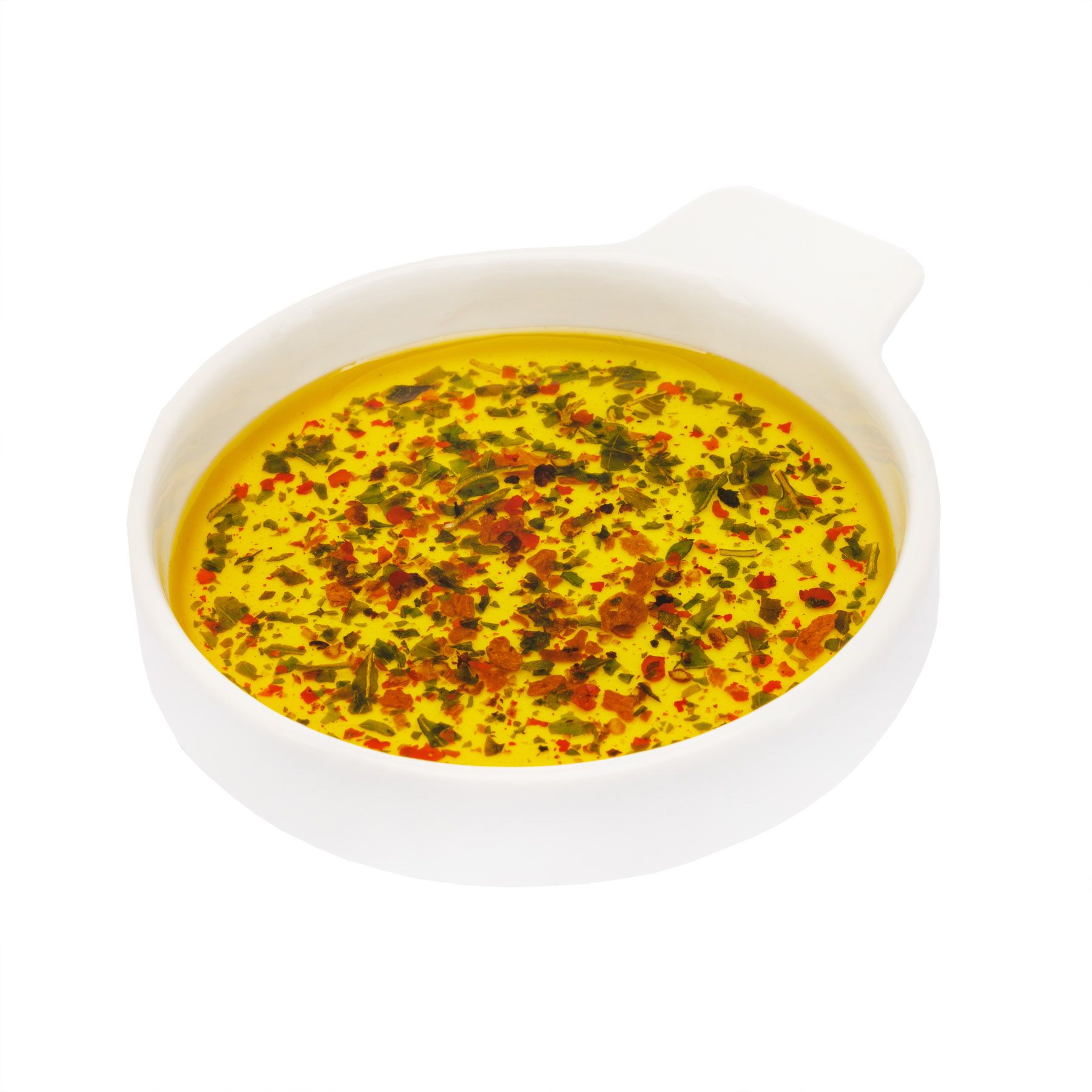 Kleine, weiße Schale mit gelber Flüssigkeit und Kräutern. Runde Form mit Griff.