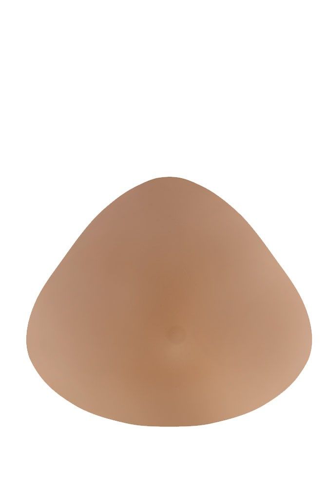 Elfenbeinfarbene Brustprothese, tropfenförmig.