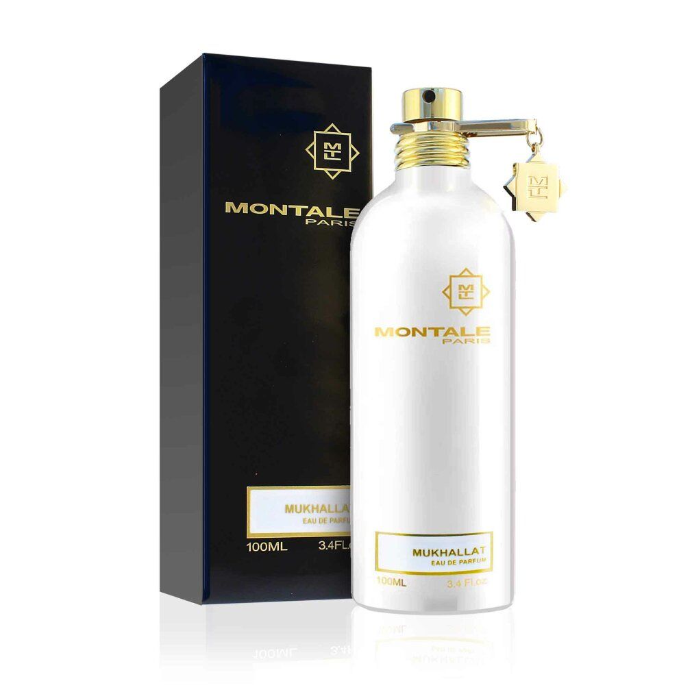 Parfümflasche und Verpackung. Weiße Flasche mit goldenen Akzenten und schwarzer Verpackung mit Logo und Produktnamen.
