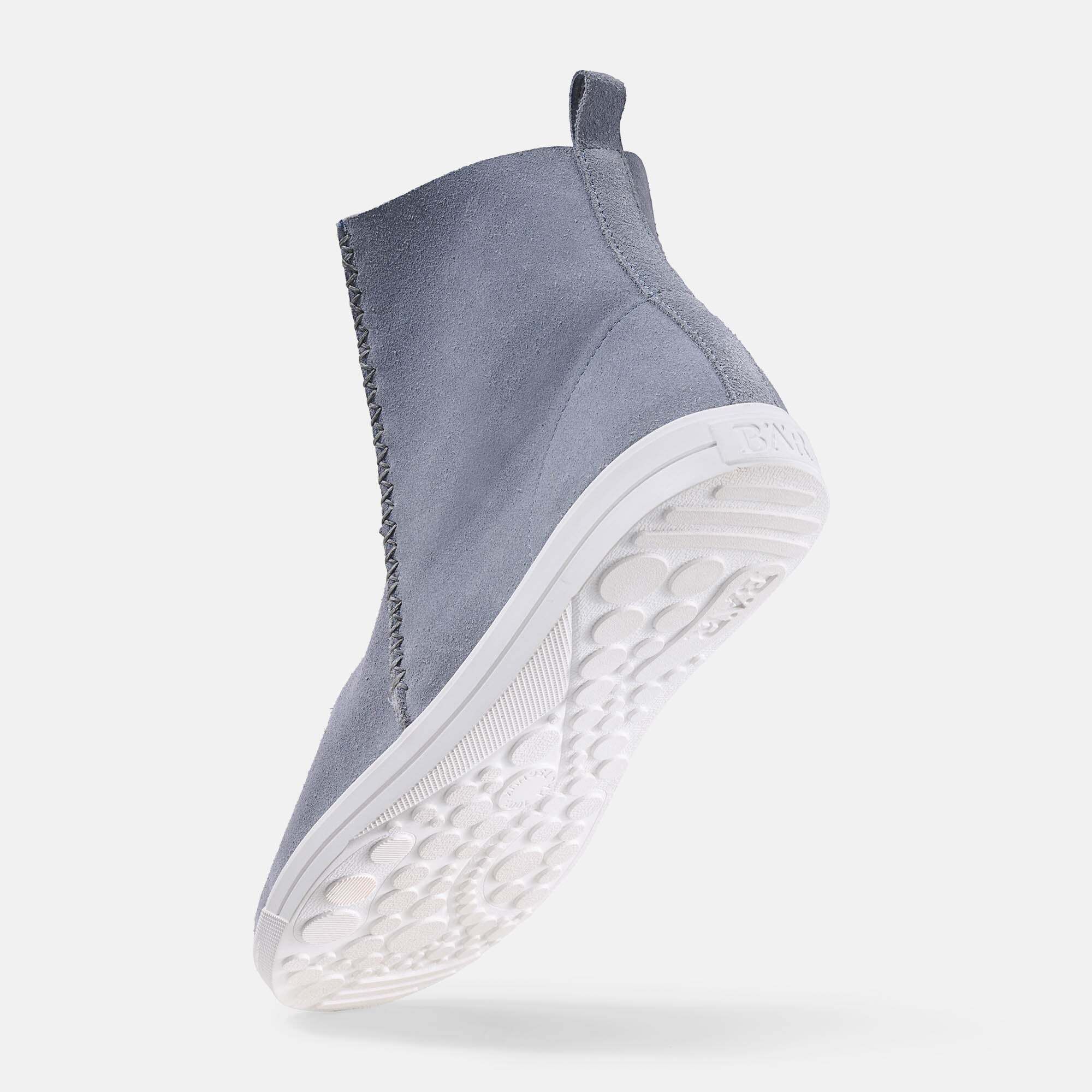 Graue Damen-Stiefelette aus Wildleder, Ansicht der profilierten weißen Sohle.