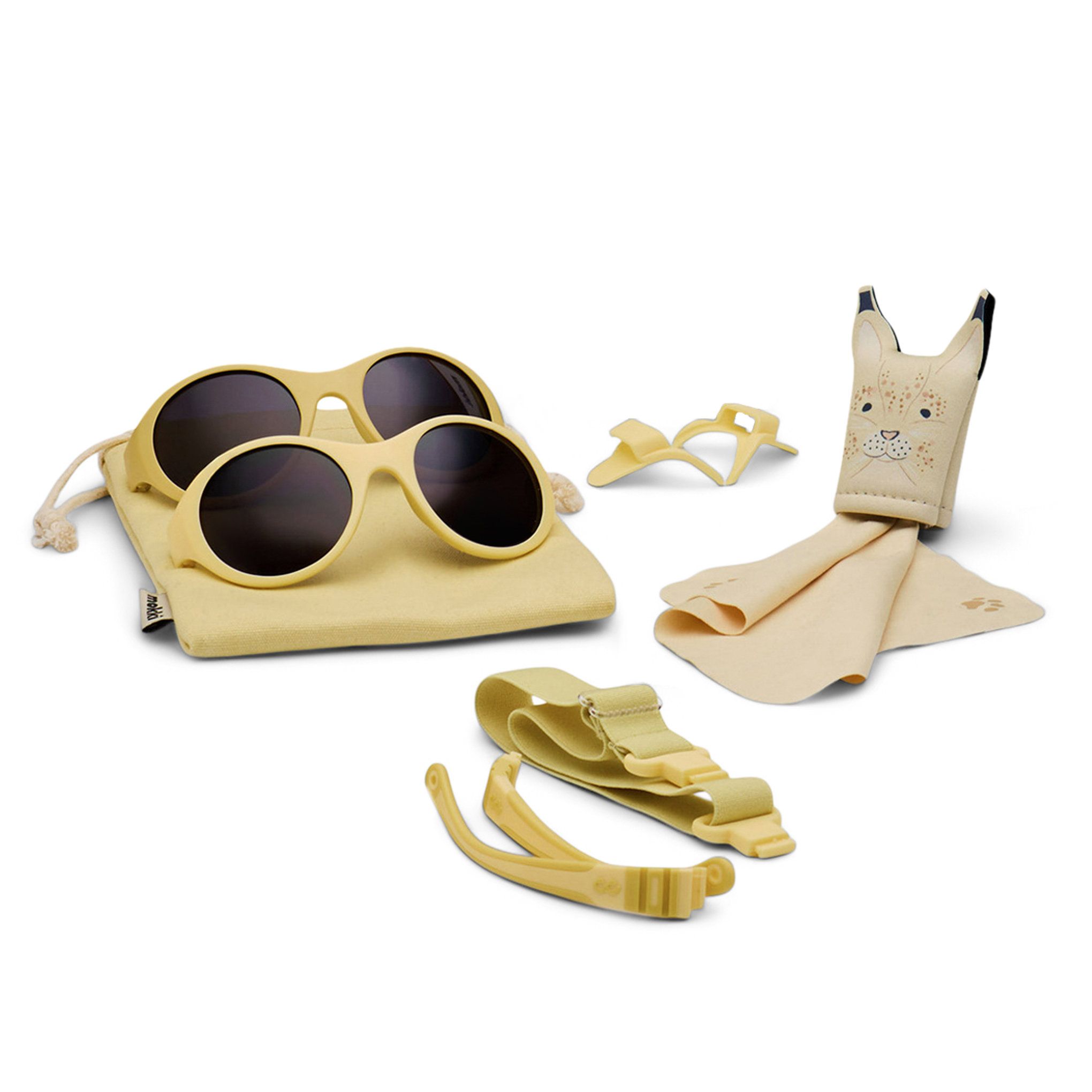 Sonnenbrille-Set für Kinder. Enthält Brille, Ersatzbügel, Band, Putztuch und Beutel. Gelbe Farbe.