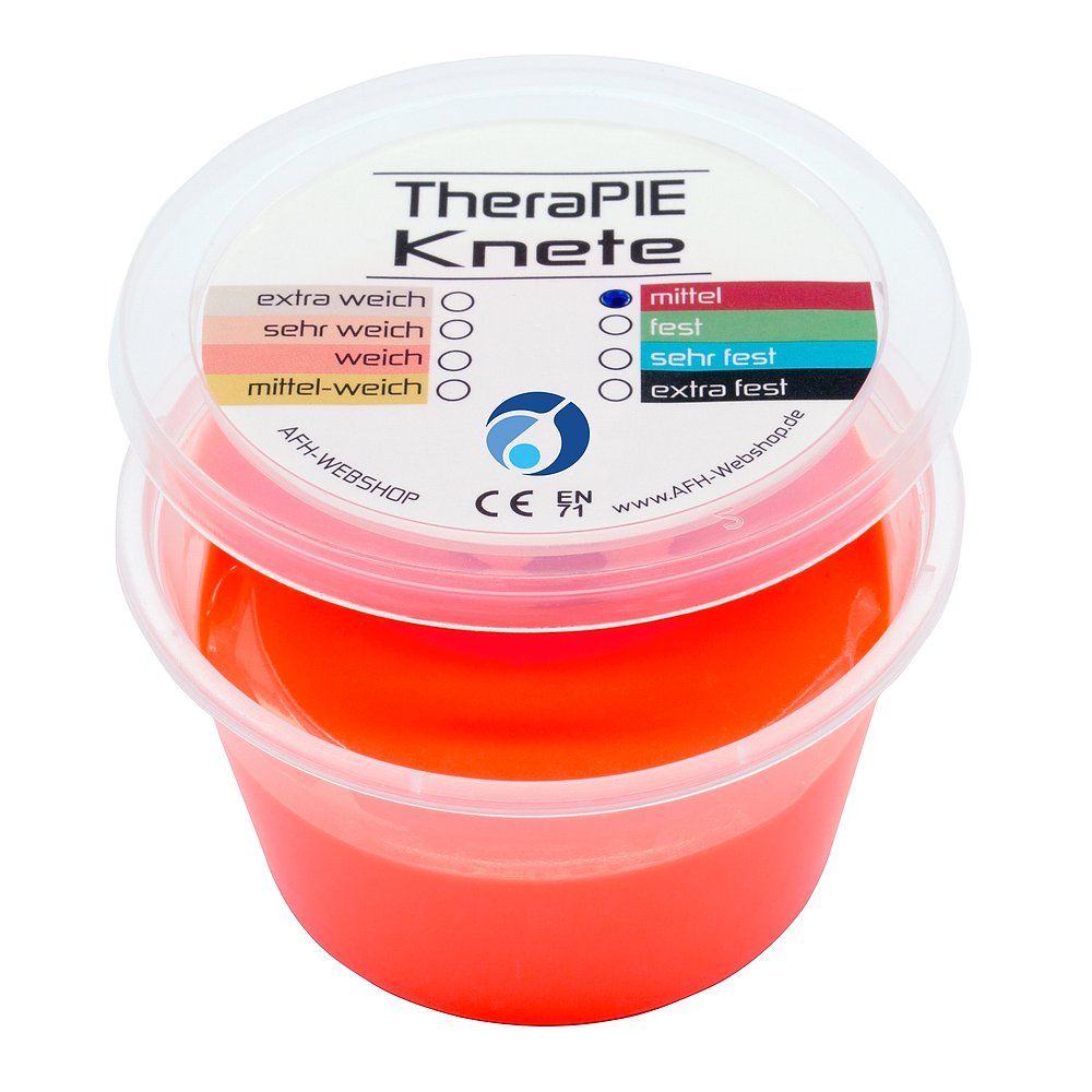 Offener Becher Therapieknete in Orange. Deckel mit Produktnamen, Farbcode und Informationen. CE-Kennzeichnung.