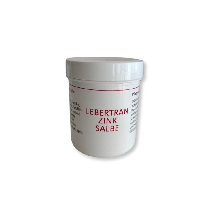 Weiße Dose mit roter Schrift: Lebertran Zink Salbe. Aufschrift auf der Dose.