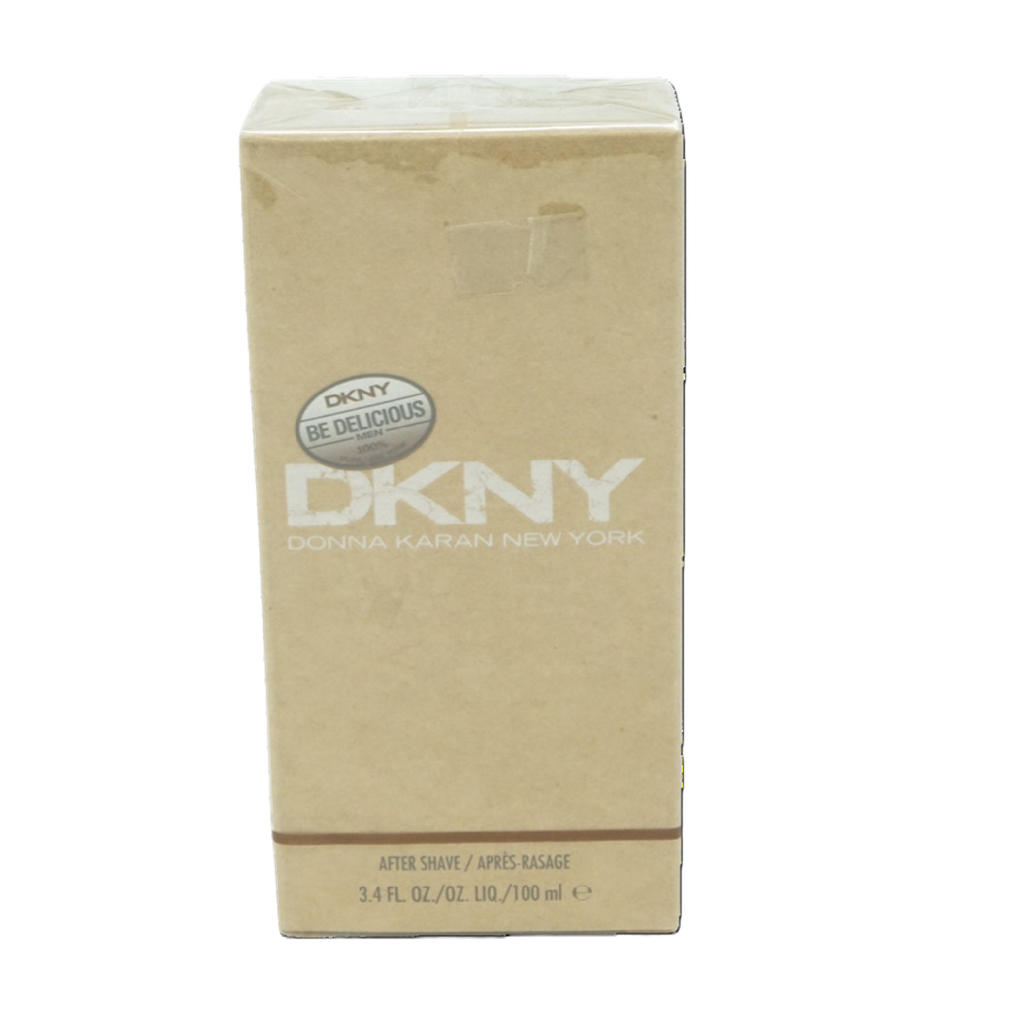 Beige Kartonverpackung. Aufschrift: DKNY Be Delicious, Donna Karan New York. Text: After Shave/Après Rasage. Volumenangabe.