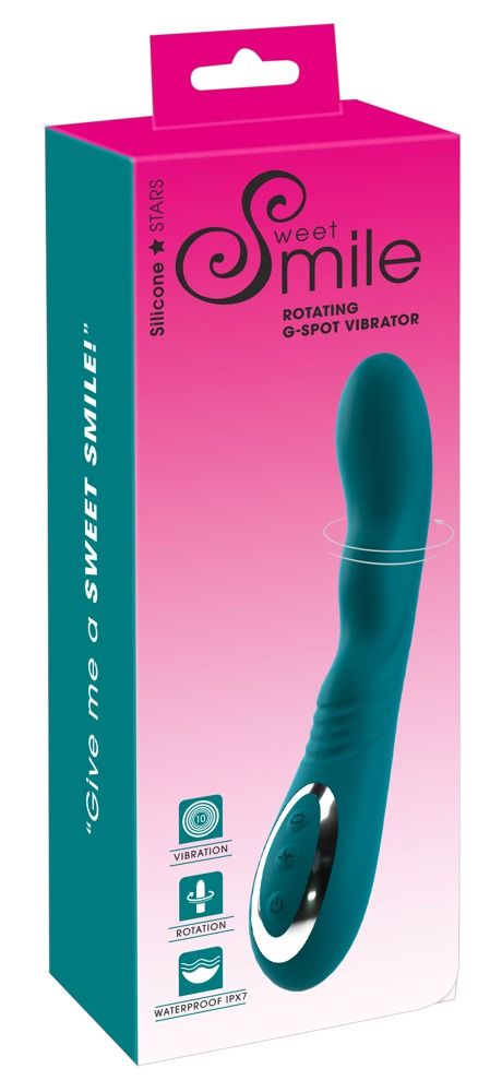 Türkisfarbener Vibrator in Verpackung. Aufschrift: Sweet Smile, G-Spot Vibrator. Verpackung mit Produktabbildung und Logos.