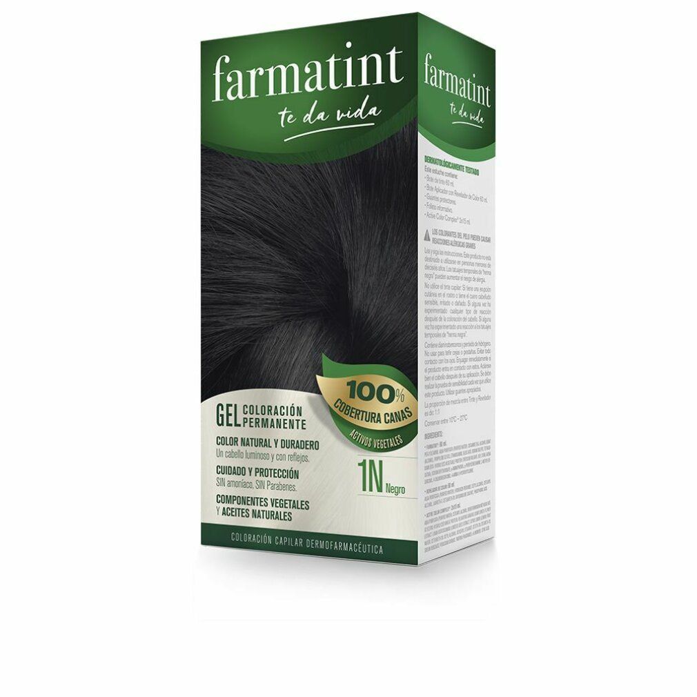 Schachtel mit Haarfärbemittel. Produktname und Farbton 1N Negro. Grün-weiße Verpackung mit Produktabbildung.
