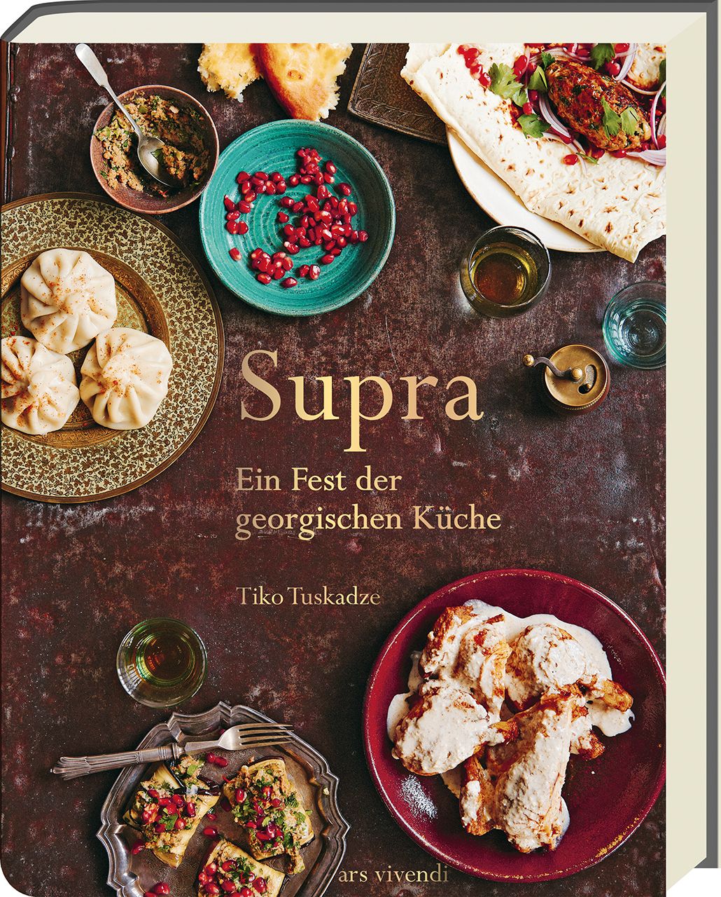 Buchcover mit dem Titel "Supra". Darunter steht "Ein Fest der georgischen Küche" und der Name des Autors Tiko Tuskadze.
