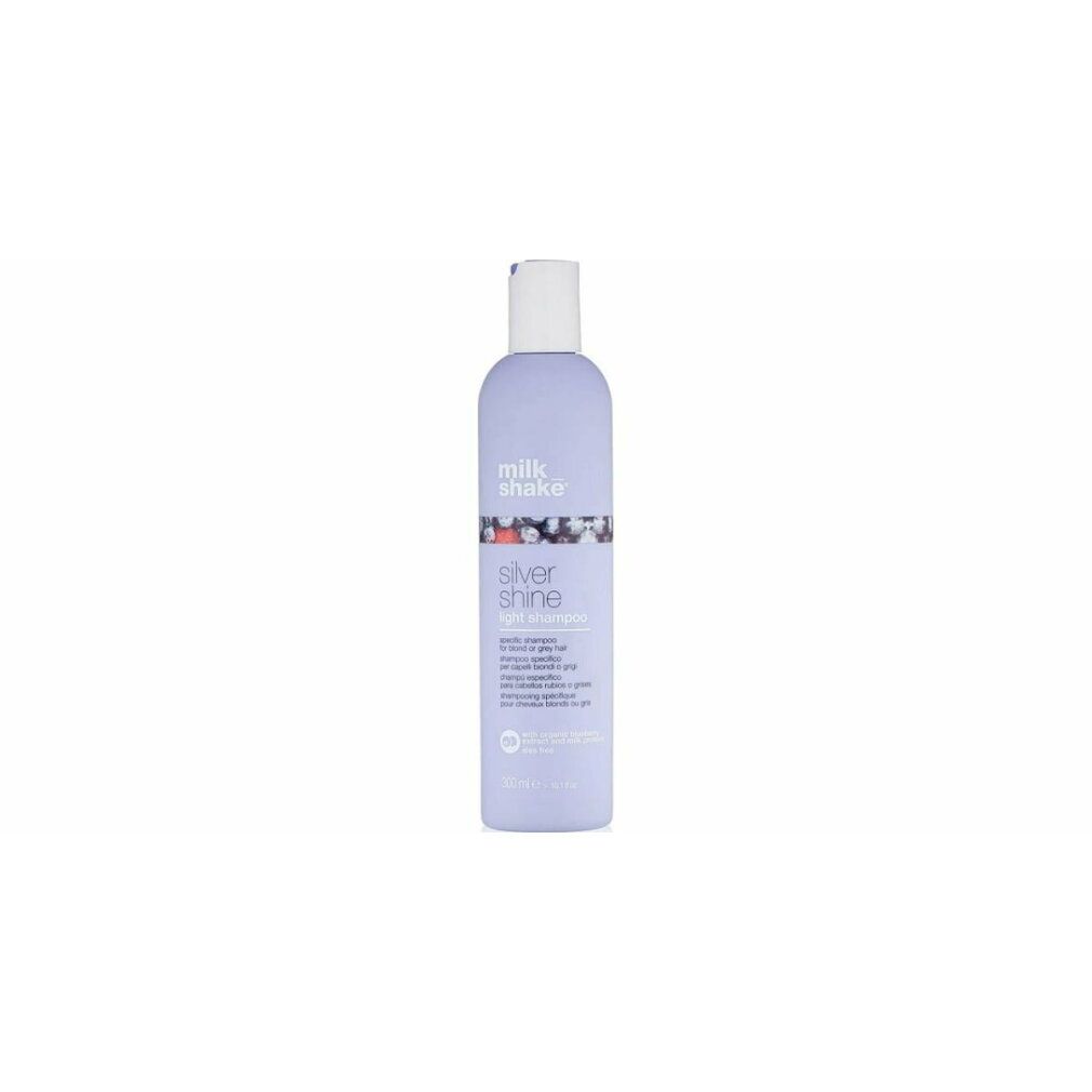 Flasche mit Pumpverschluss. Aufschrift: milk_shake, silver shine light shampoo. Inhalt: 250 ml.