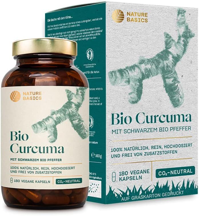 Braune Glasflasche und Kartonverpackung. Aufschrift: Bio Curcuma mit schwarzem Bio Pfeffer. 180 vegane Kapseln. CO2-neutral.