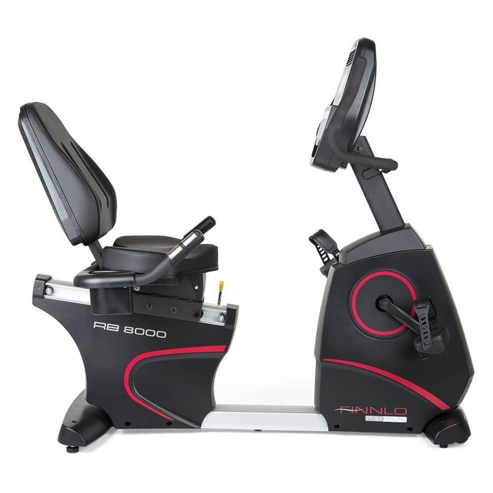 Ergometer. Schwarzes Fitnessgerät mit roter Akzentlinie. Rückenlehne, Sitz, Pedale und Display. Marke Finnlo.
