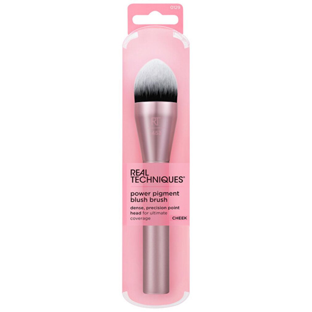 Rougepinsel in rosa Verpackung. Auf der Verpackung steht 'Real Techniques' und 'power pigment blush brush'.