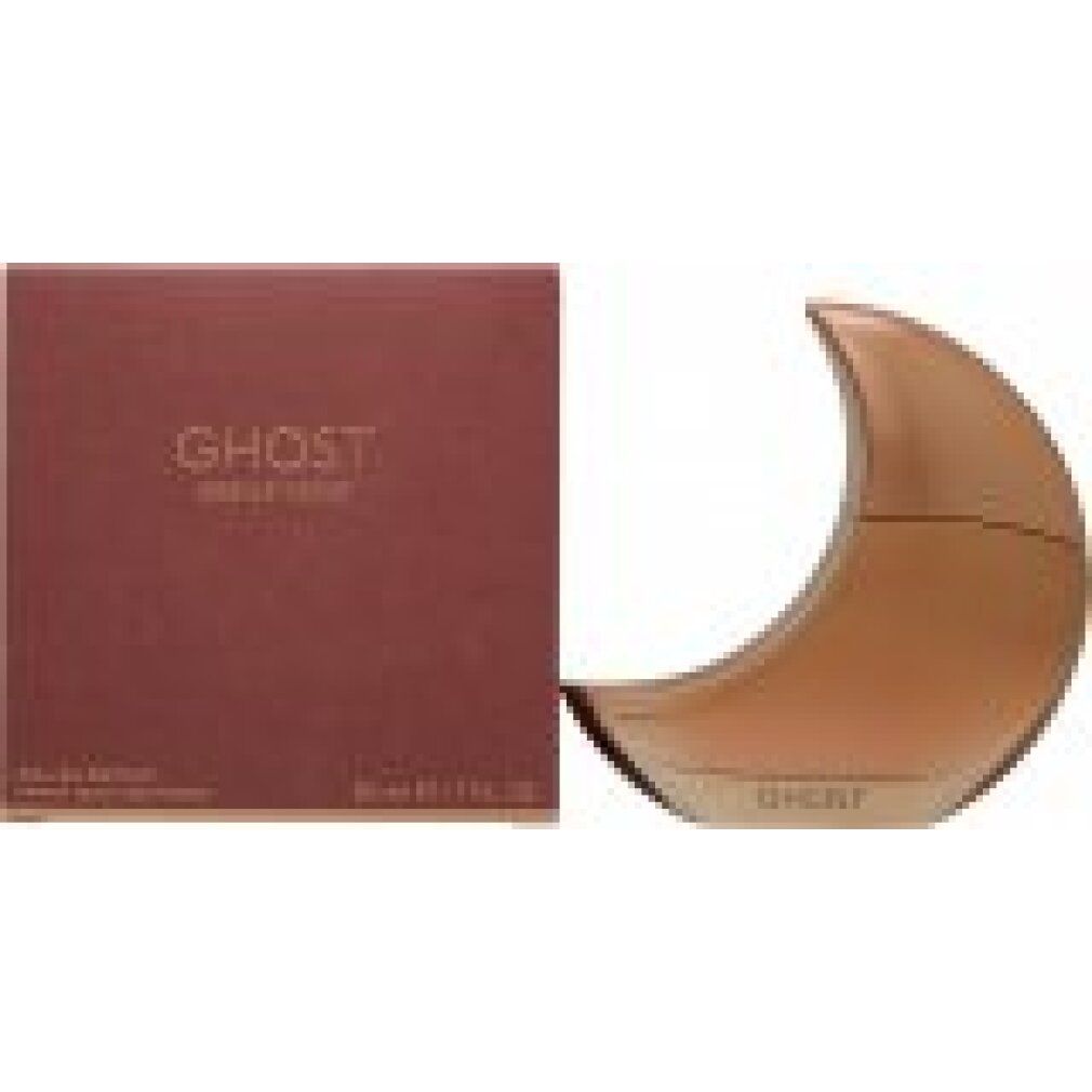 Parfümflakon in Mondform und rechteckige Verpackung. Verpackung mit Schriftzug "GHOST". Flakon und Verpackung in Rosé-Gold-Tönen.