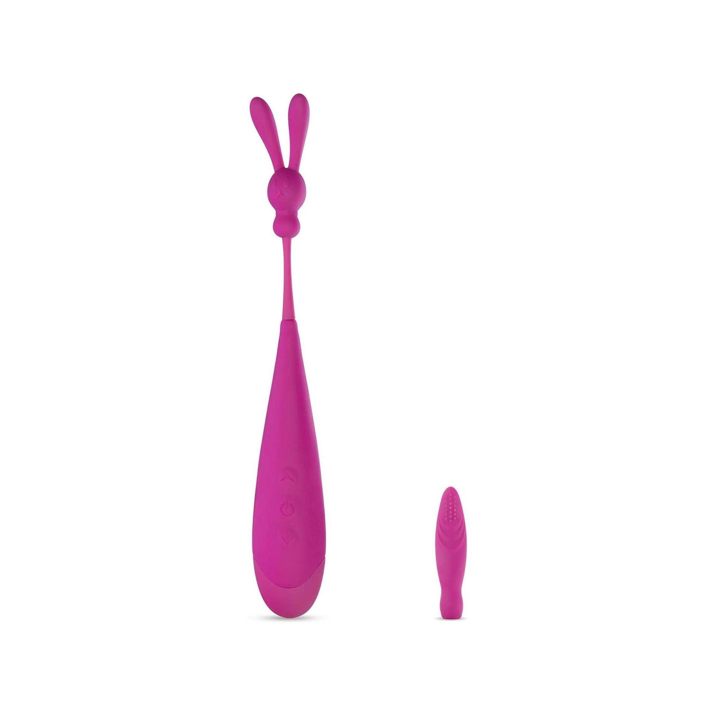 Rosa Vibrator mit zwei Aufsätzen: Tropfenform und länglicher Aufsatz. Auf weißem Hintergrund.