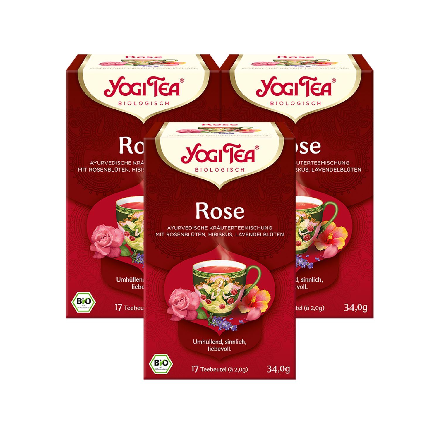 Drei Packungen Yogi Tea Rose Bio Kräutertee. Rote Verpackung mit Logo und Produktbezeichnung. 17 Teebeutel.
