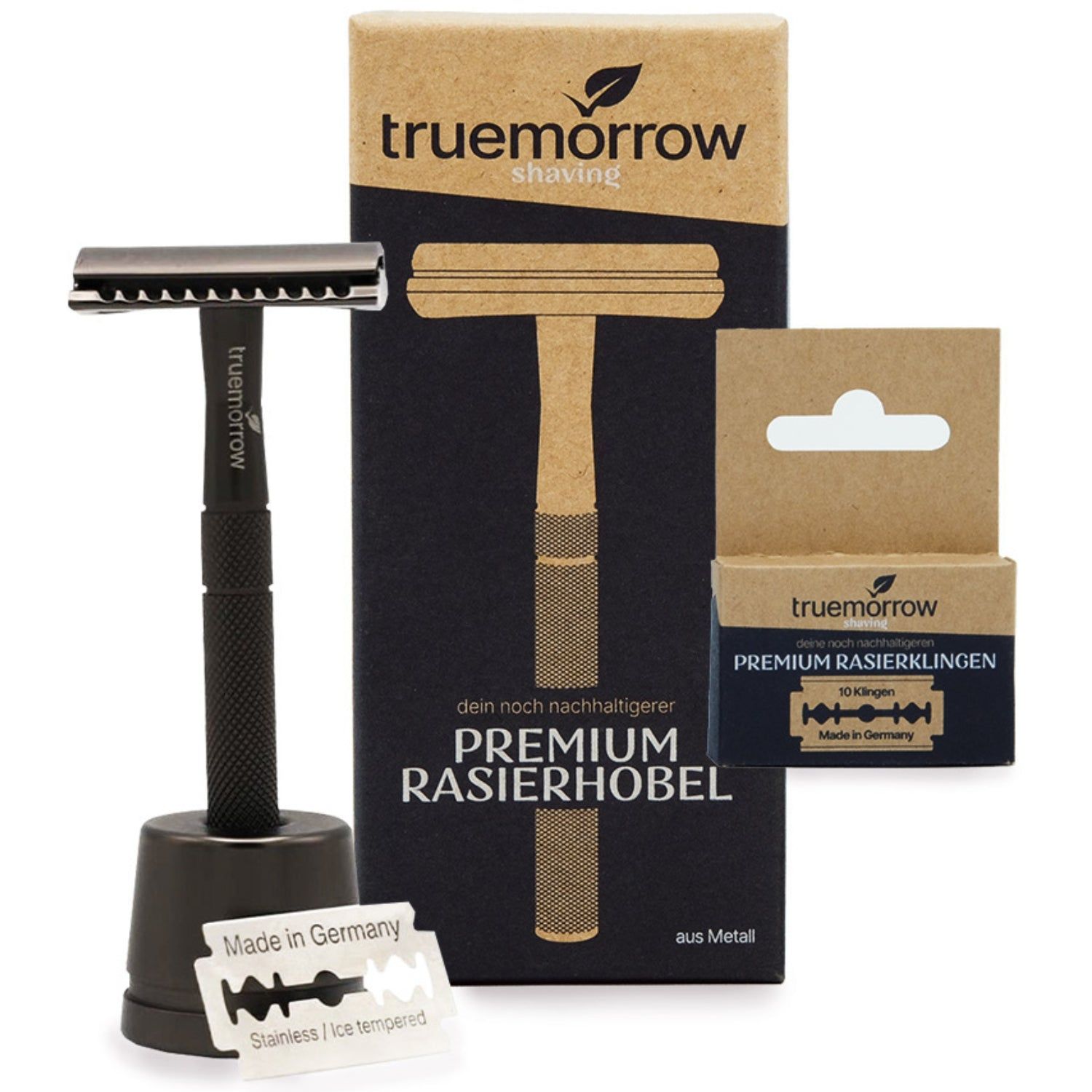 Anthrazit Rasierhobel mit Ständer, Klingen und Verpackung. Aufschrift: truemorrow, Premium Rasierhobel, Premium Rasierklingen.