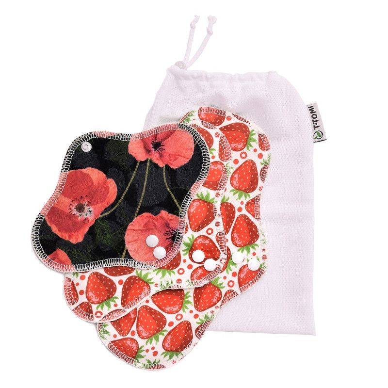 Stoffbinden mit Mohn- und Erdbeermuster, weißer Beutel mit Logo.