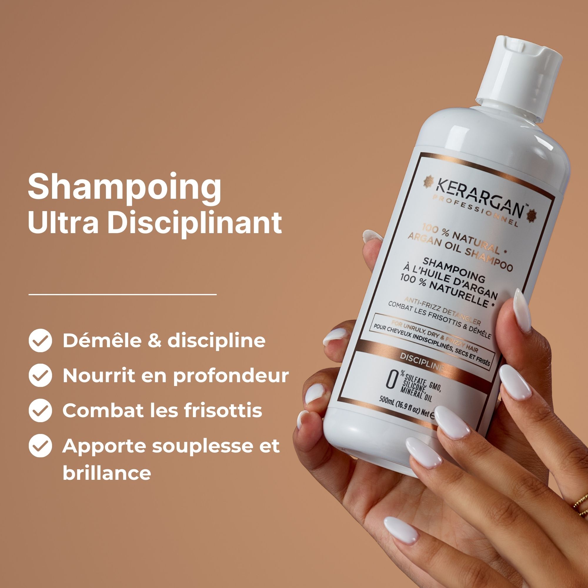 Shampooing Kerargan. Flacon blanc avec étiquette. Texte: Ultra Disciplinant, anti-frisottis. Main manucurée.