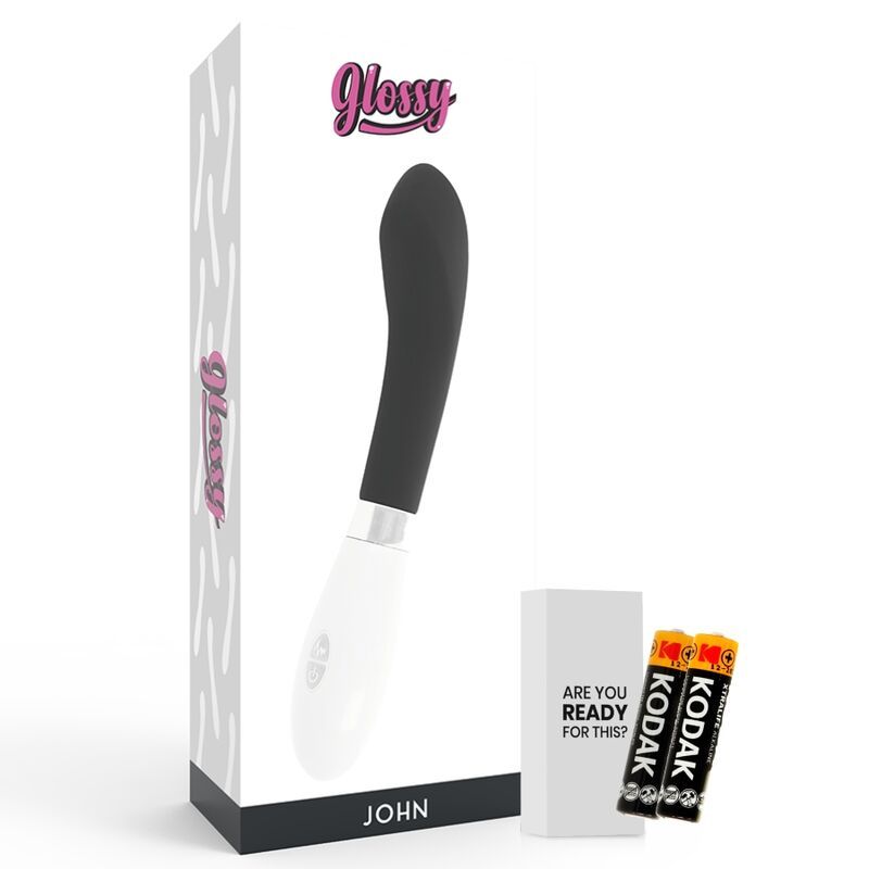 Verpackung mit Silikonvibrator. Produktname: GLOSSY. Inklusive Batterien und einer kleinen Box mit Text.