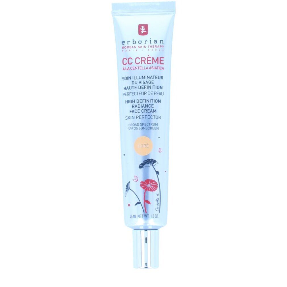 Silberne Tube mit CC Crème. Text und Logo. Blütenmuster. 45 ml. SPF 25. Farbton Doré.