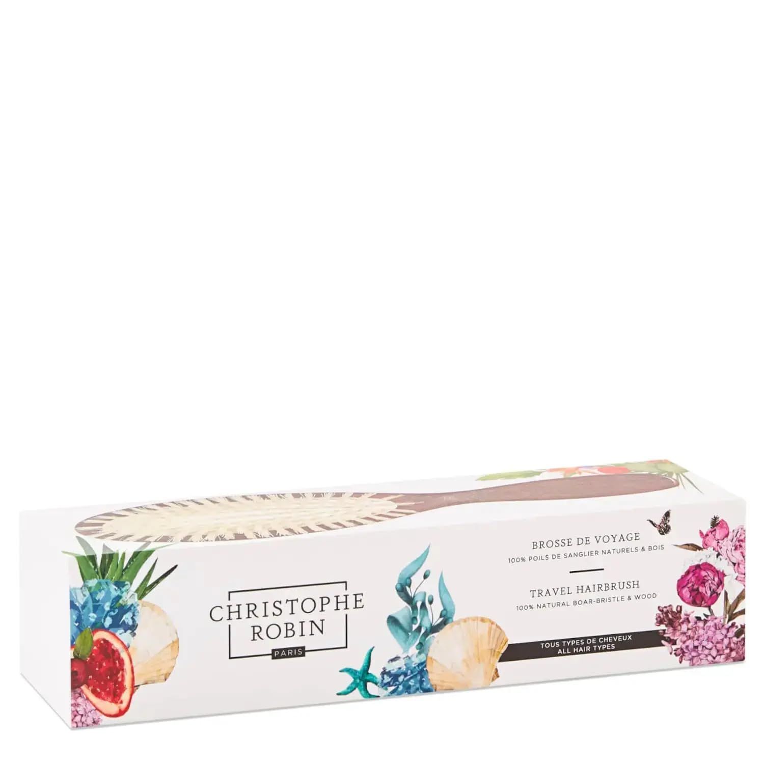 Verpackung mit Haarbürste. Text: 'Christophe Robin Paris', 'Brosse de Voyage', '100% poils de sanglier naturels & bois'.