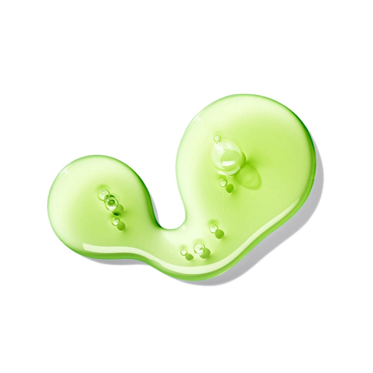 Grüner Tropfen Flüssigseife. Runde Form mit Bläschen. Auf weißem Hintergrund.