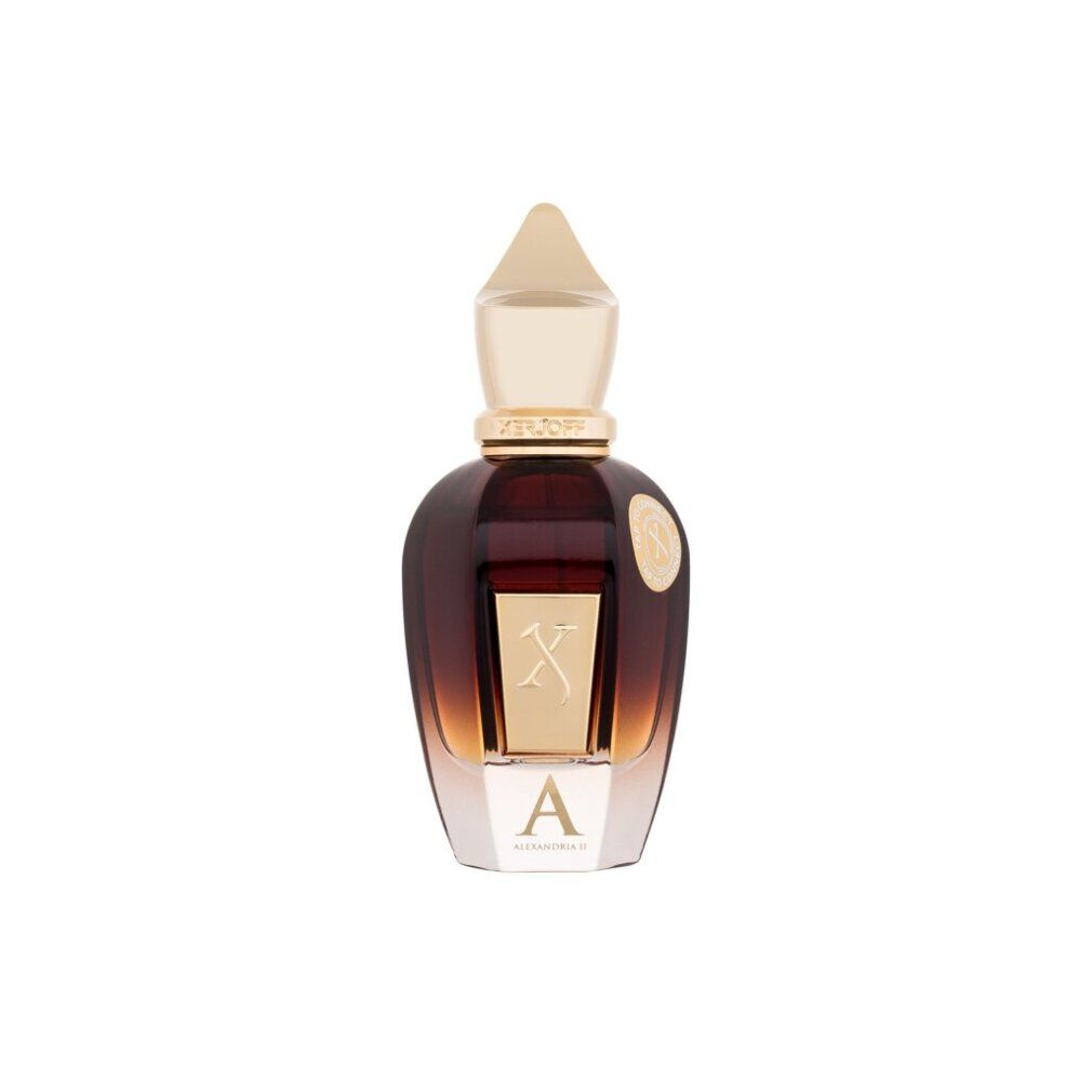 Braune Flasche mit goldener Kappe. Aufschrift "X" und "A". Goldener Aufkleber.