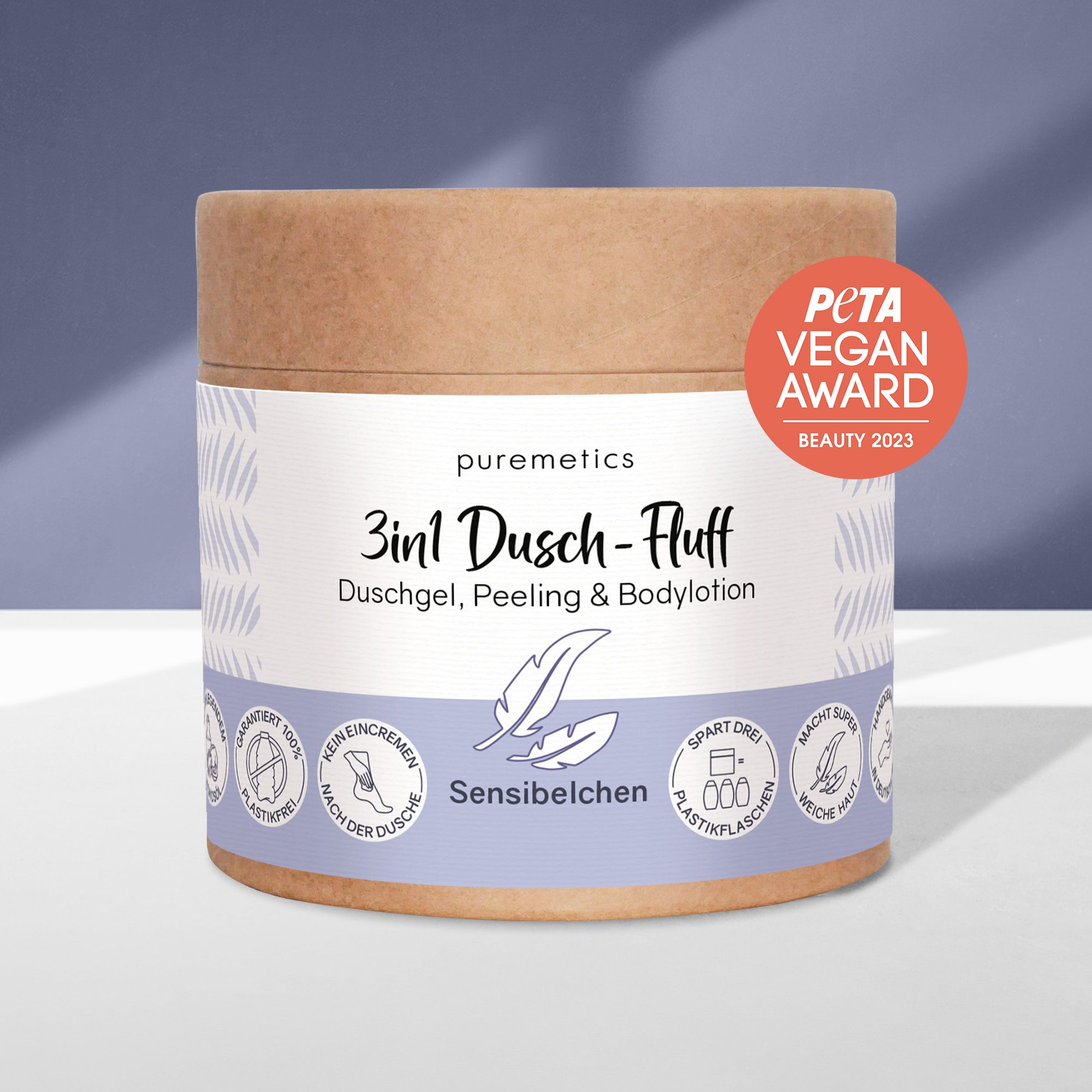 Behälter mit Produktetikett. PETA Vegan Award. Text: 3in1 Dusch-Fluff, Sensibelchen. Duschgel, Peeling & Bodylotion.