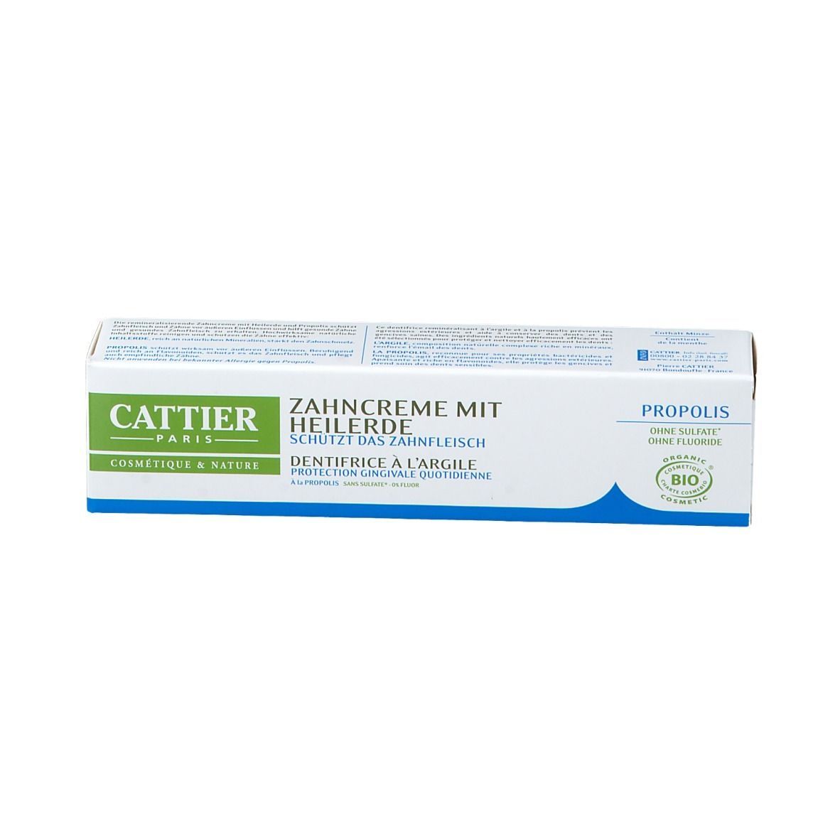 Zahncreme-Schachtel, weiß-grün-blau. Text: CATTIER, Zahncreme mit Heilerde, Propolis, BIO-Siegel.