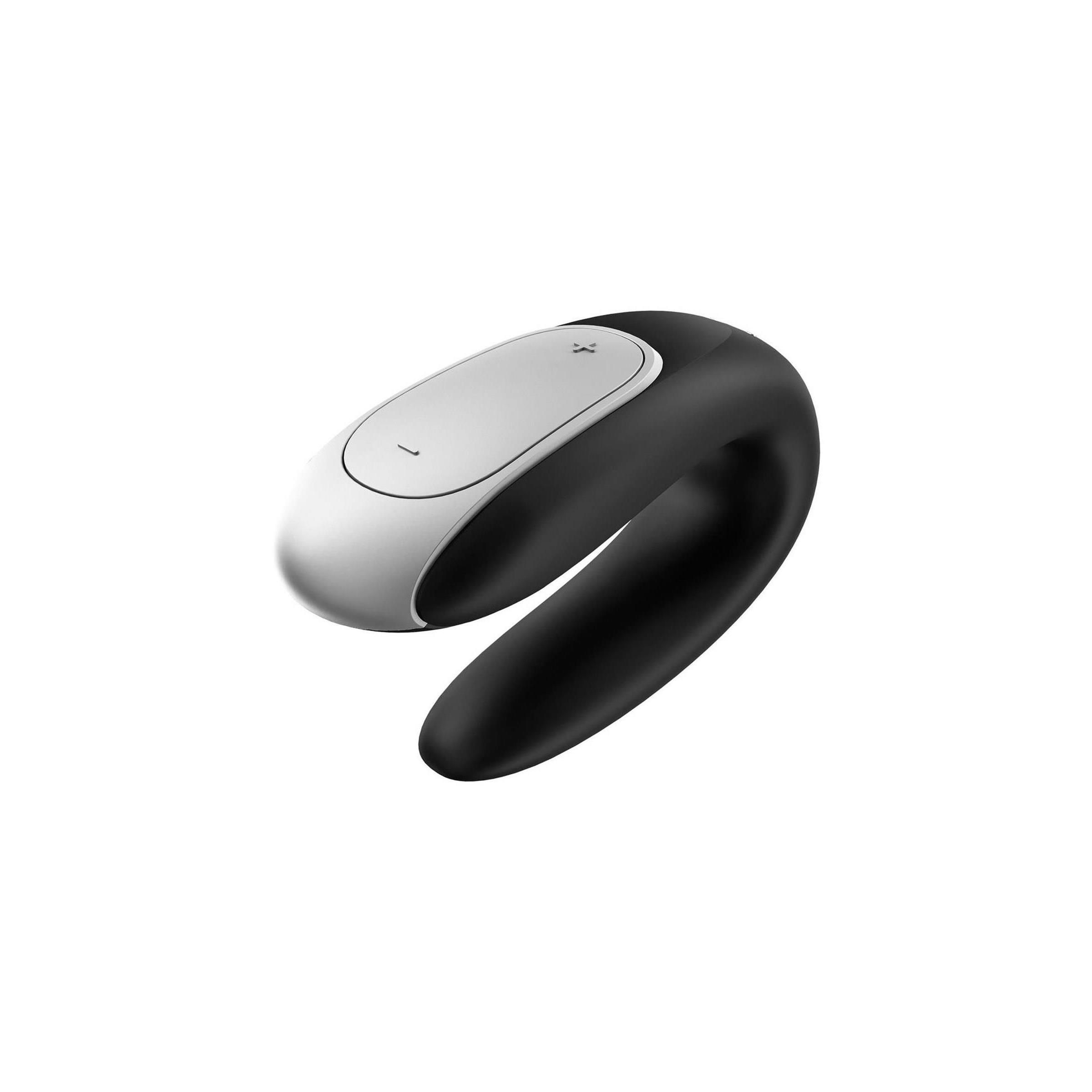 Schwarzes, U-förmiges Gerät mit silberner Oberseite. Abgerundete Form.