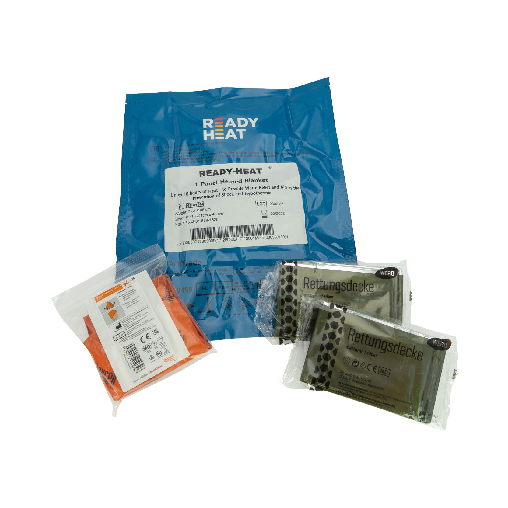 Mehrere Rettungsdecken und Zubehör in Verpackungen. Aufschrift: READY-HEAT. Etikett mit Produktinformationen.