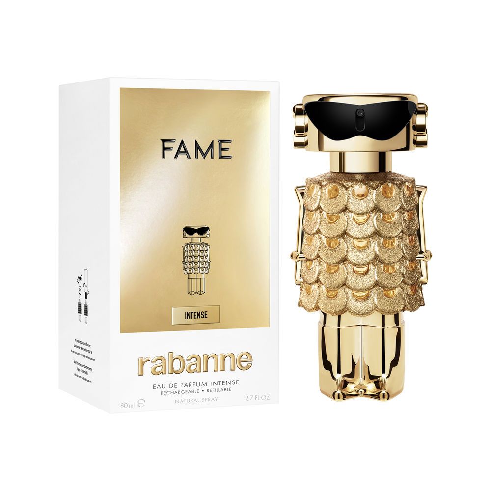 Goldfarbener Flakon mit schwarzer Sonnenbrille und Schuppenmuster. Weiße Schachtel mit goldener Aufschrift "FAME" und "rabanne".