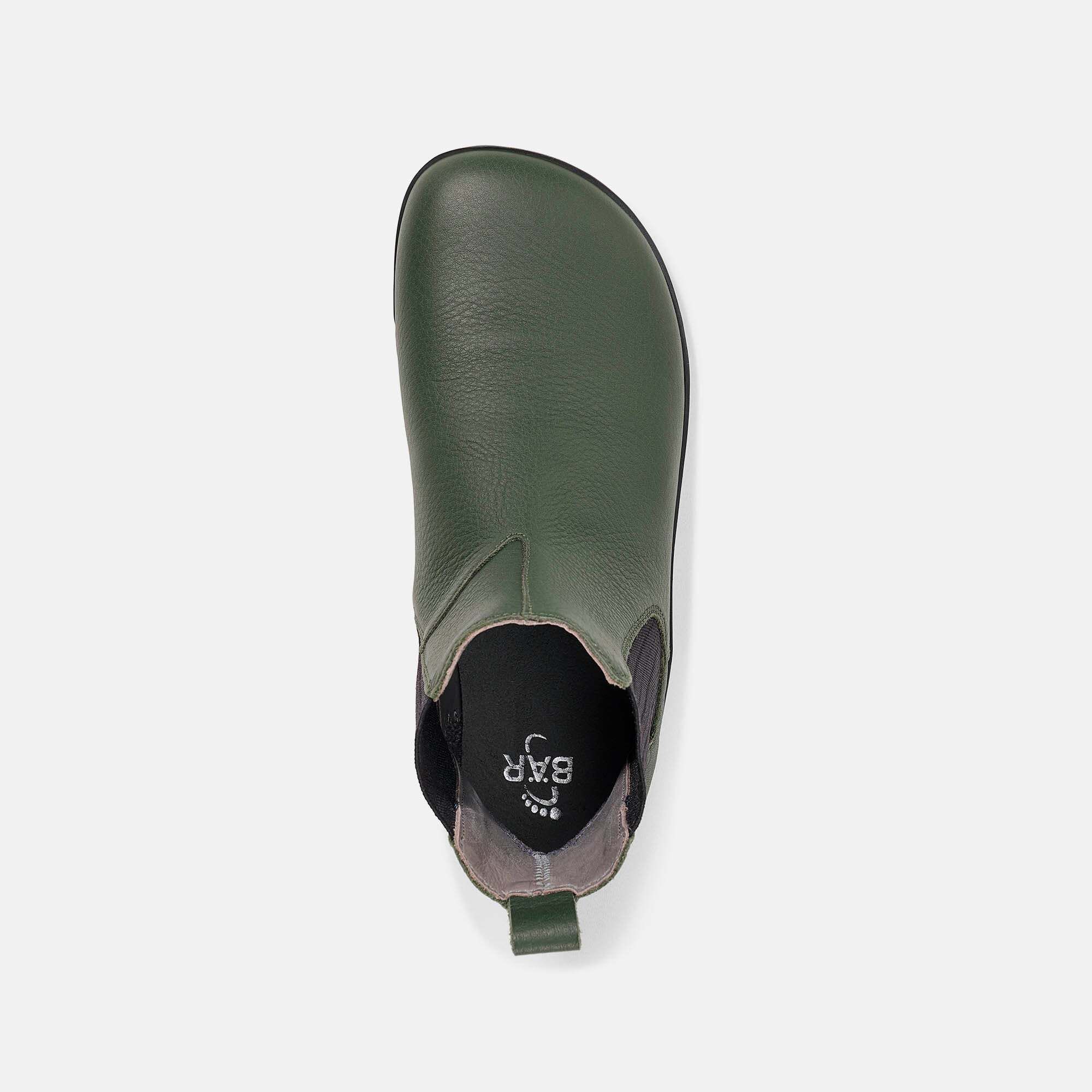 Grüner Chelsea-Stiefel aus Leder mit elastischen Seiteneinsätzen.