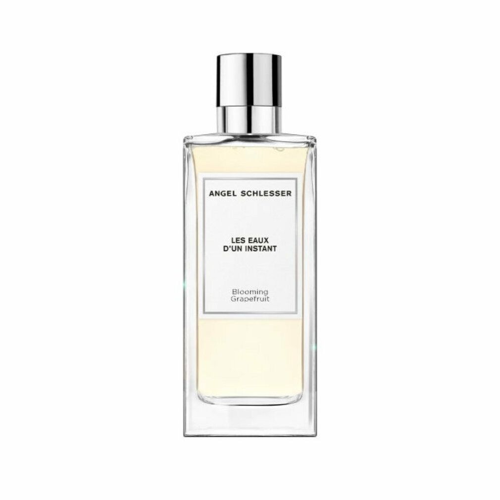 Rechteckige Glasflasche mit silbernem Verschluss. Aufschrift: Angel Schlesser, Les Eaux d'Un Instant, Blooming Grapefruit.