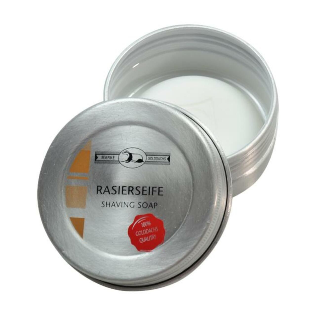 Geöffnete Dose Rasierseife. Aufschrift: RASIERSEIFE SHAVING SOAP. Marke GOLDDACHS. Roter Aufkleber: 100% GOLDDACHS Qualität.
