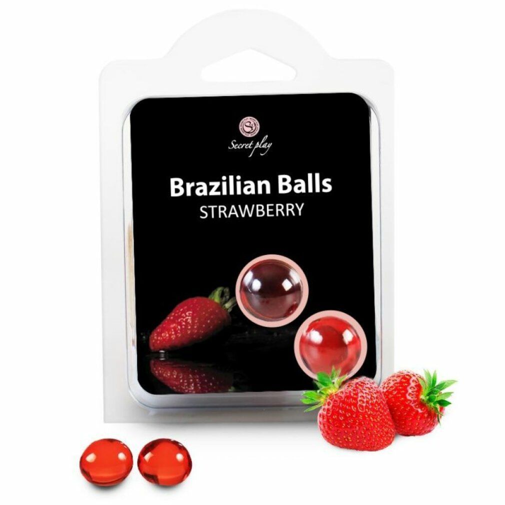 Verpackung mit zwei roten, runden Objekten und zwei Erdbeeren. Aufschrift: Brazilian Balls Strawberry.