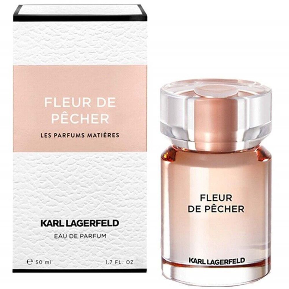 Fleur de Pêcher Eau de Parfum von Karl Lagerfeld. Flakon und Verpackung. Flakon mit transparentem Verschluss und rosafarbenem Inhalt.