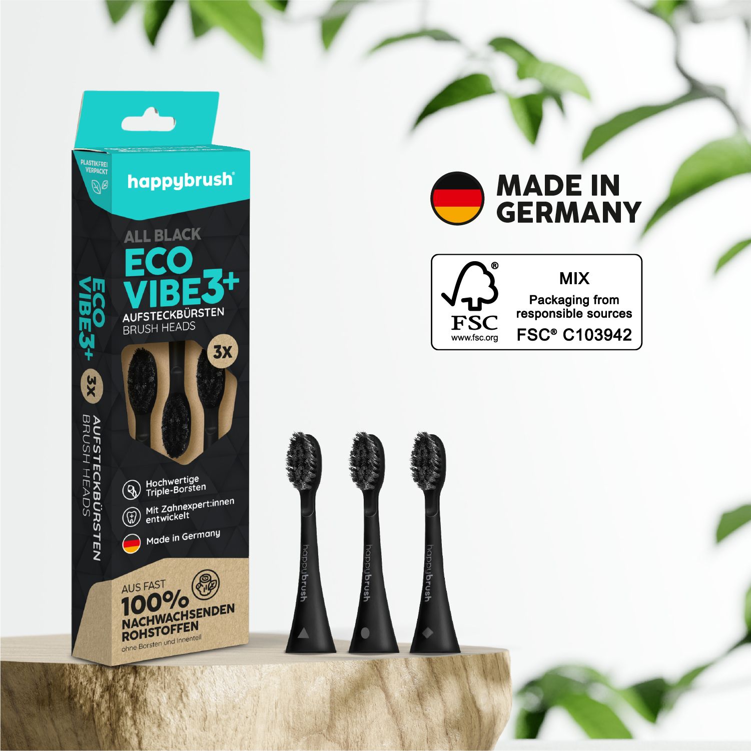 Verpackung und drei schwarze Aufsteckbürsten. Text: All Black, Eco Vibe 3+, Made in Germany, 100% nachwachsende Rohstoffe.