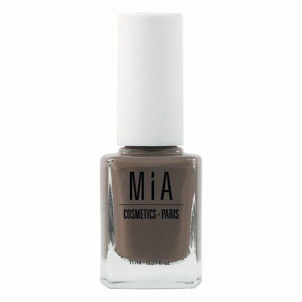 Nagellackflasche mit brauner Farbe und weißem Deckel. Aufschrift: Mía Cosmetics Paris. Volumen: 11 ml.