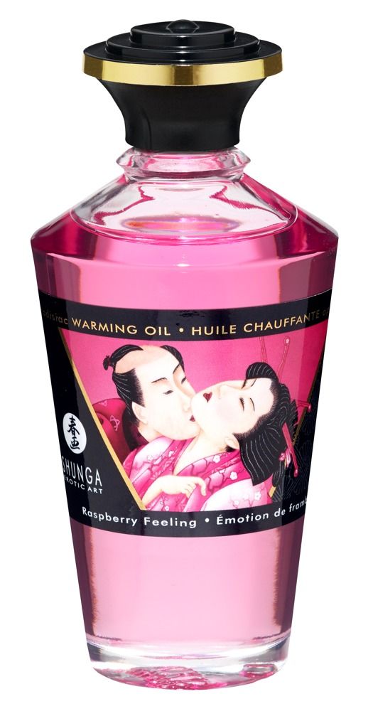 Rosa Massageöl-Flasche mit schwarzem Deckel. Aufdruck mit küssendem Paar. Text: Shunga, Warming Oil, Himbeer-Feeling.