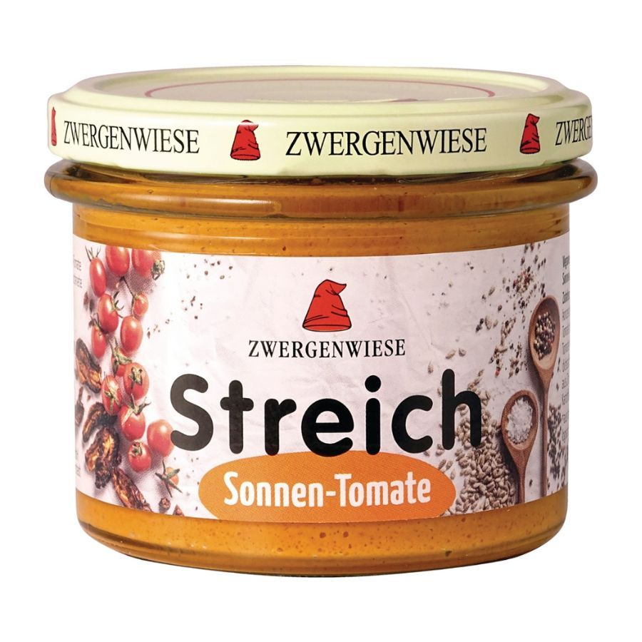 Glas mit Aufschrift Zwergenwiese Streich Sonnen-Tomate. Deckel mit Logo und Schriftzug. Inhalt orange.